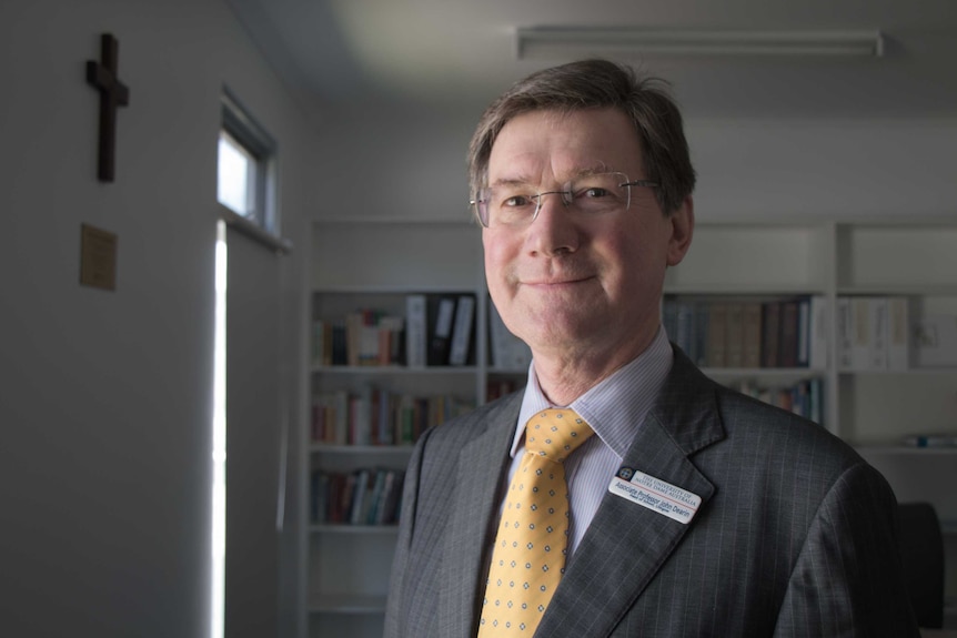 Associate Professor John Dearin stands in his Lithgow office