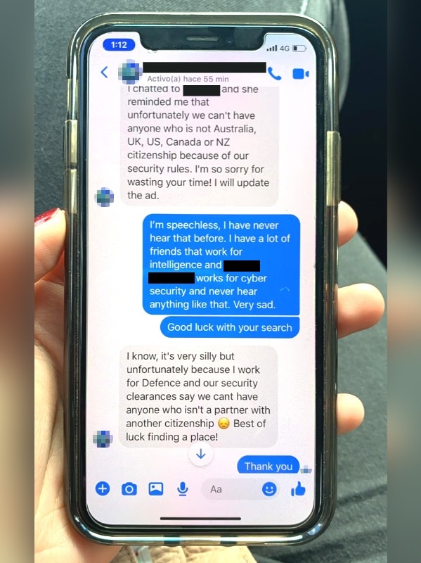 A text message exchange shows a public servant refusing a woman as a potential housemate because of her nationality.