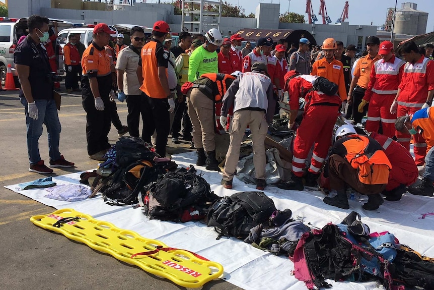 Luggage recovered from the crash site was taken to a port in Jakarta.
