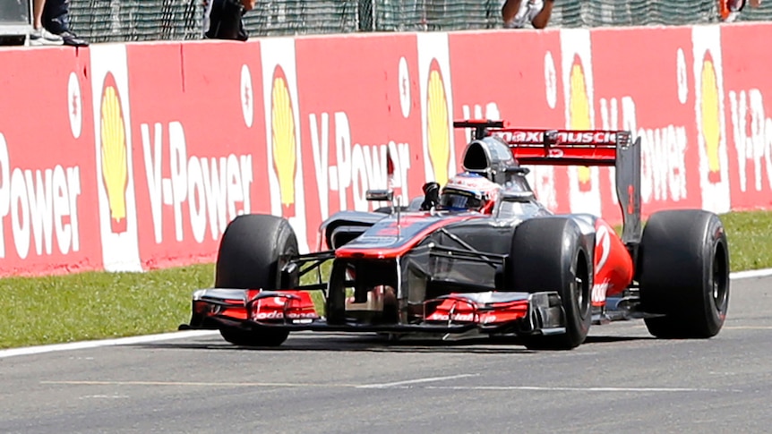 Button takes the chequered flag at Spa.