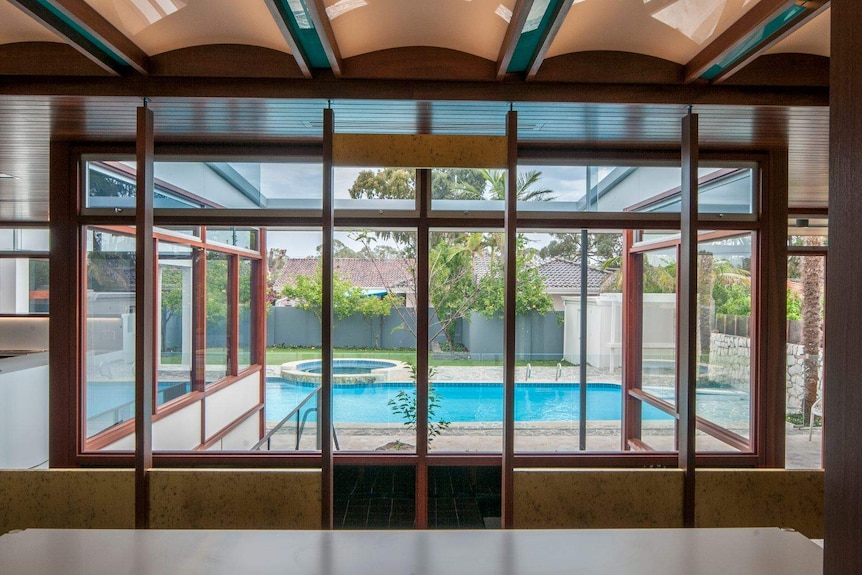 The Paganin House pool can be seen through windows in the house.