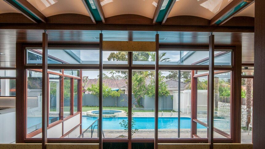 The Paganin House pool can be seen through windows in the house.