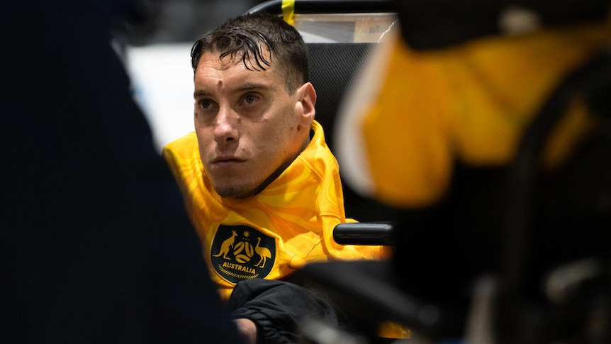 a close up shot Australian powerchair player Abdullah Karim at the world cup in sydney