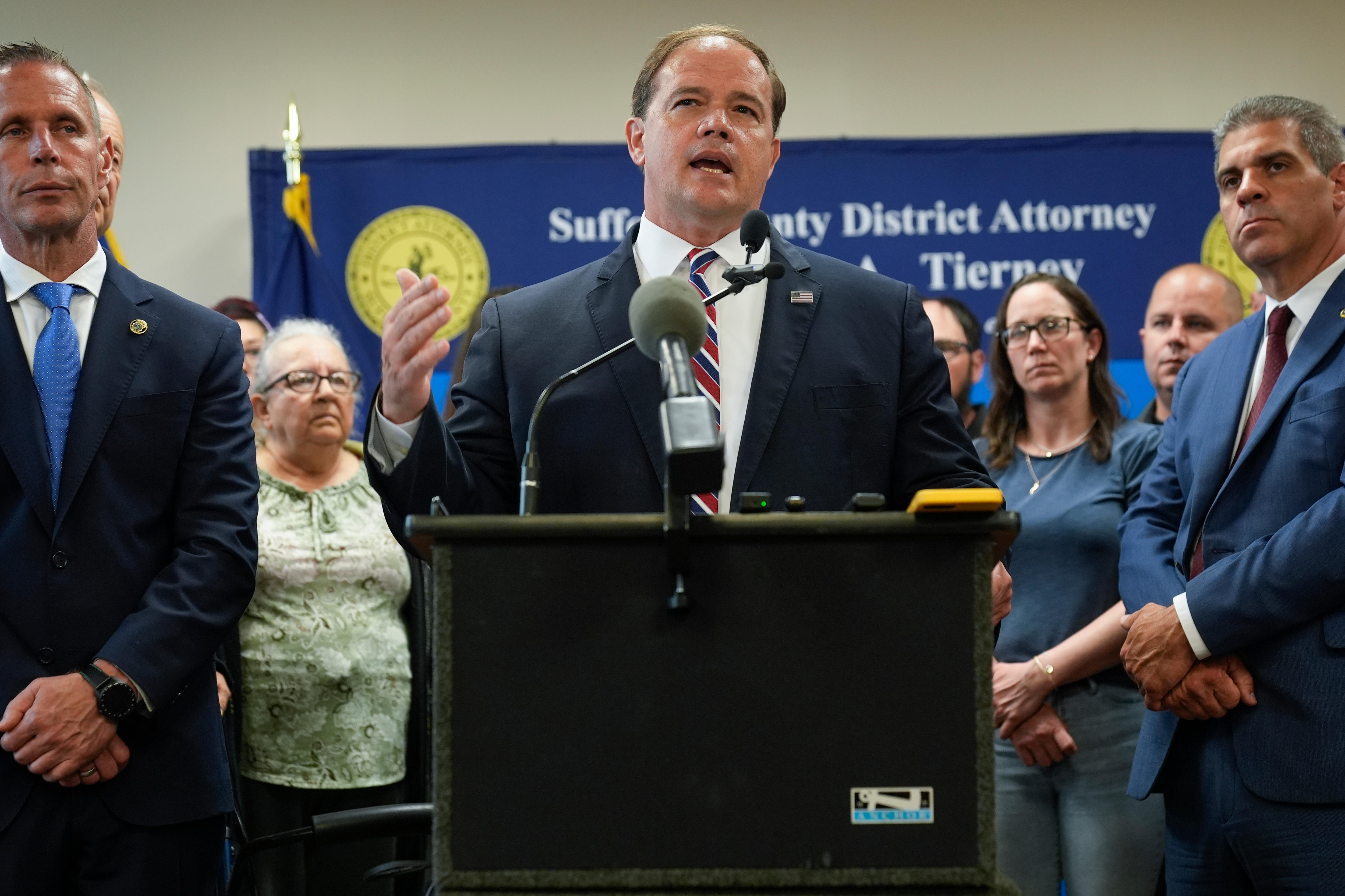 Suffolk County District Attorney Ray Tierney speaks to reporters. 