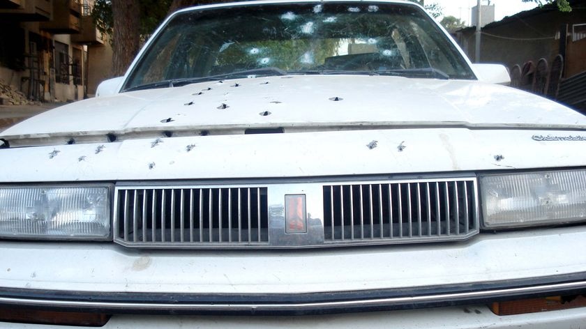 Bullet holes riddle the car in which Armenian women Genevia Antranick and Mary Awanis were killed