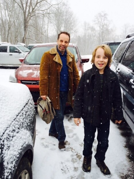 Ed Oxenbould in snow with father Jamie