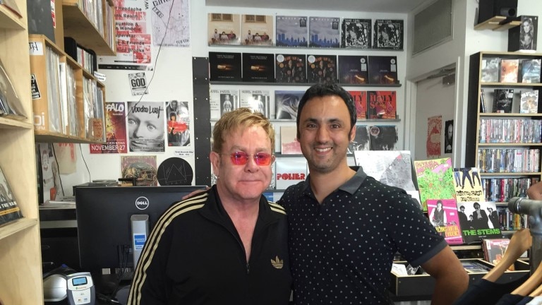 Elton John at record store