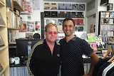 Elton John at record store