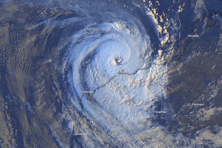 A cloud spiral representing Tropical Cyclone Damien is sitting right above the city of Karratha.