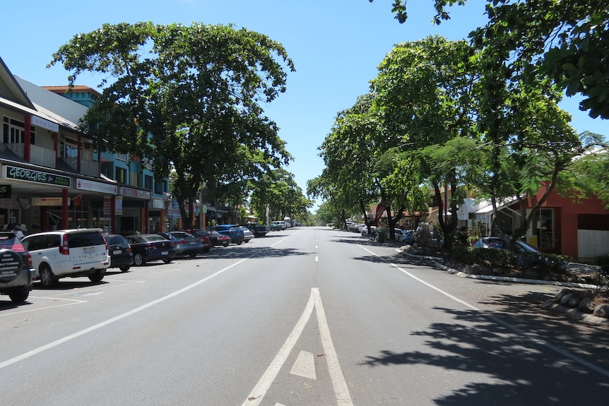 Main street of a tropical town.
