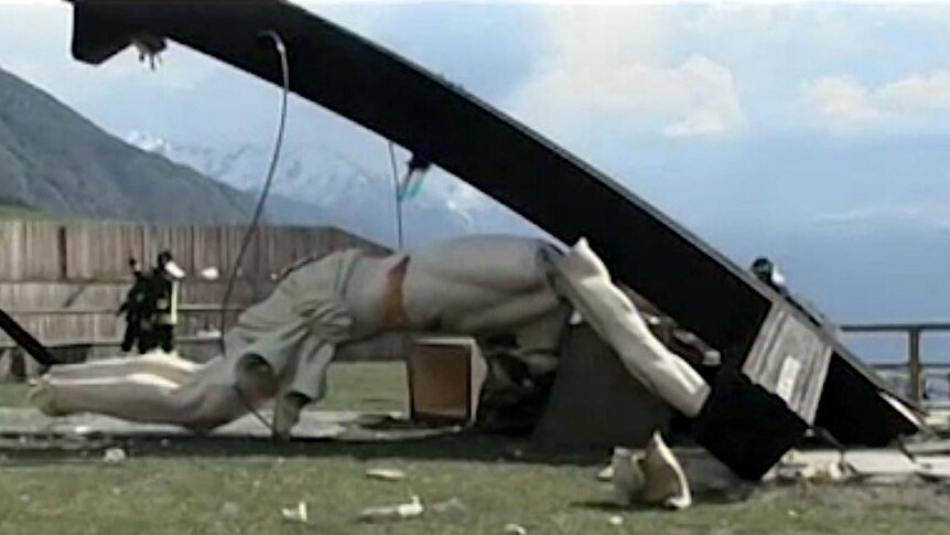 The 30-metre high wooden cross toppled over during an event near the Alpine village of Cevo.