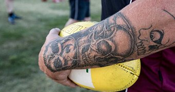 Man holds a football