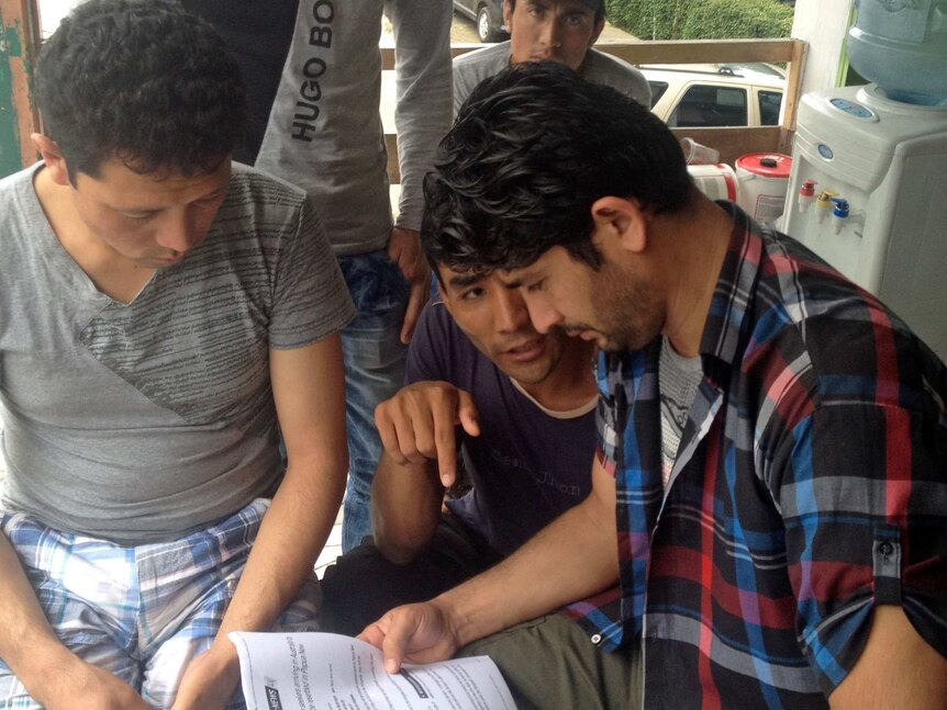 Translator explains PNG deal to Afghan asylum seekers in Indonesia