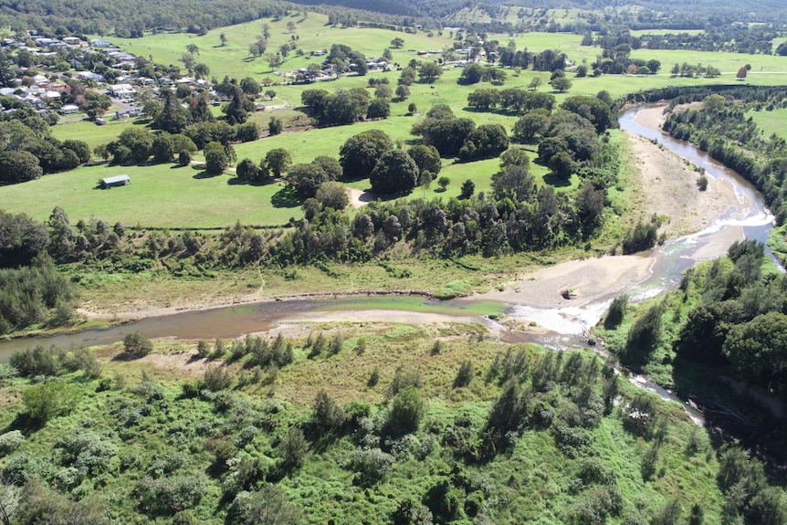 Showing a river repair site downstream that is now covered with vegetation.