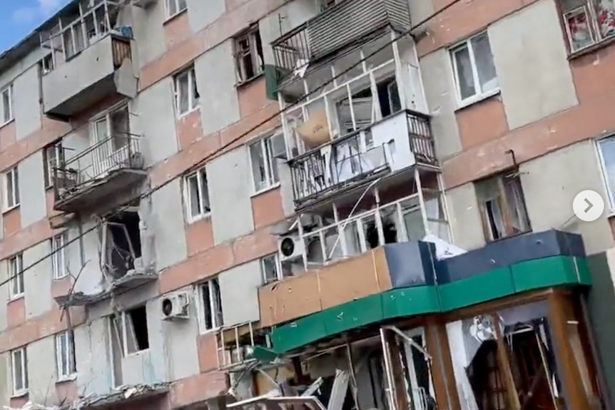 A destroyed building in Sievierodonetsk is shown with damage to walls
