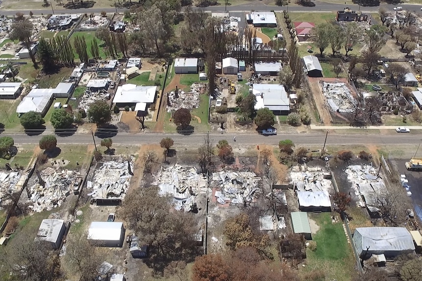 An aerial shot of homes burnt by fire