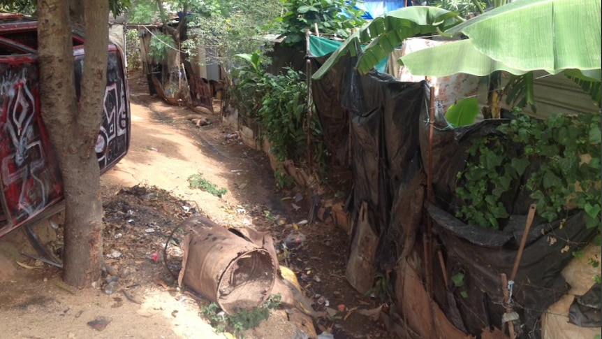 The drain in Port Moresby where West Papuan refugees have built small homes and businesses.