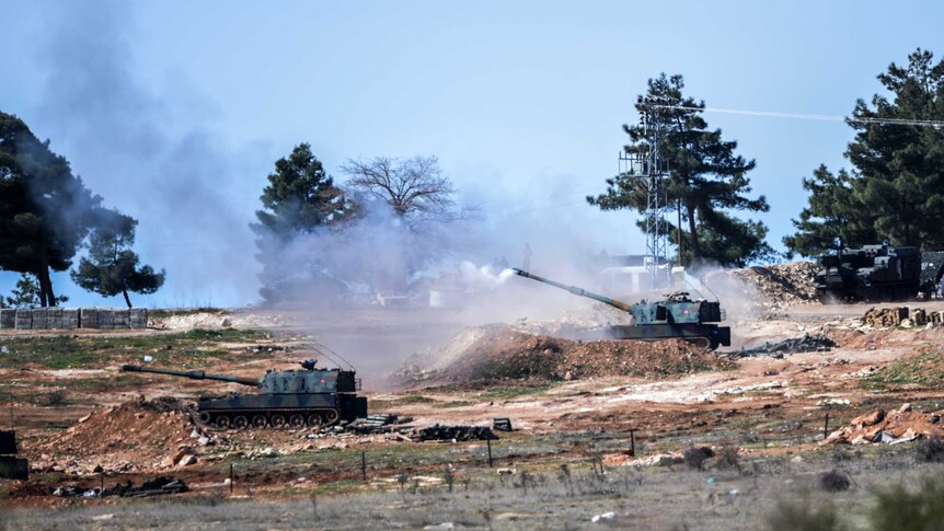 Turkish tanks stationed at the border.
