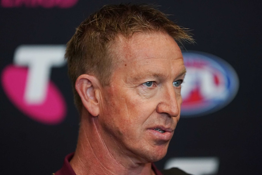 A Brisbane Lions assistant AFL coach speaks at a 2019 media conference in Melbourne.