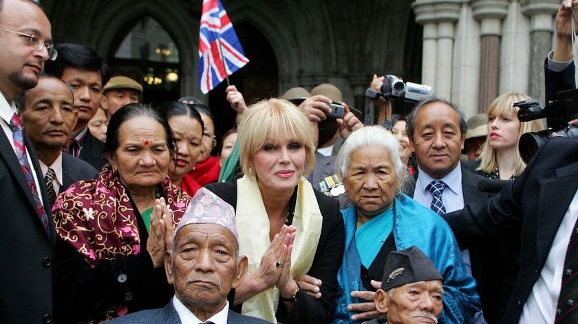 British actress Joanna Lumley joins ex-Gurkhas, including Victoria Cross winner Tul Bahadour Pun, front left, outside the High Court.