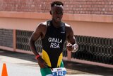 South African triathlete Mhlengi Gwala running wearing national outfit