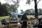 A campsite for homeless people at a showground.