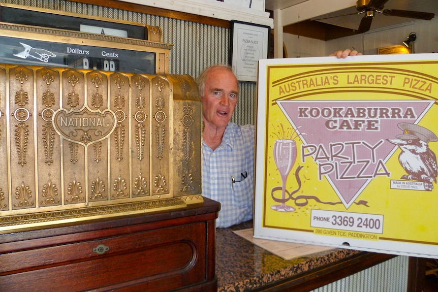 Steve Hall with a pizza box in Paddington.