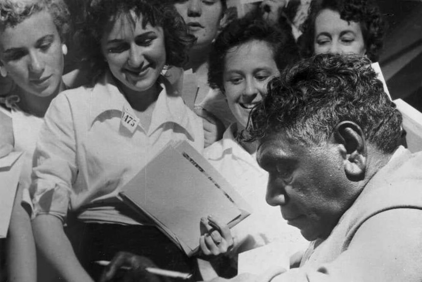 Albert Namatjira signing autographs