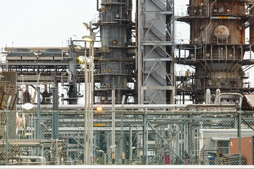 The rusted metal infrastructure of the Altona oil refinery.