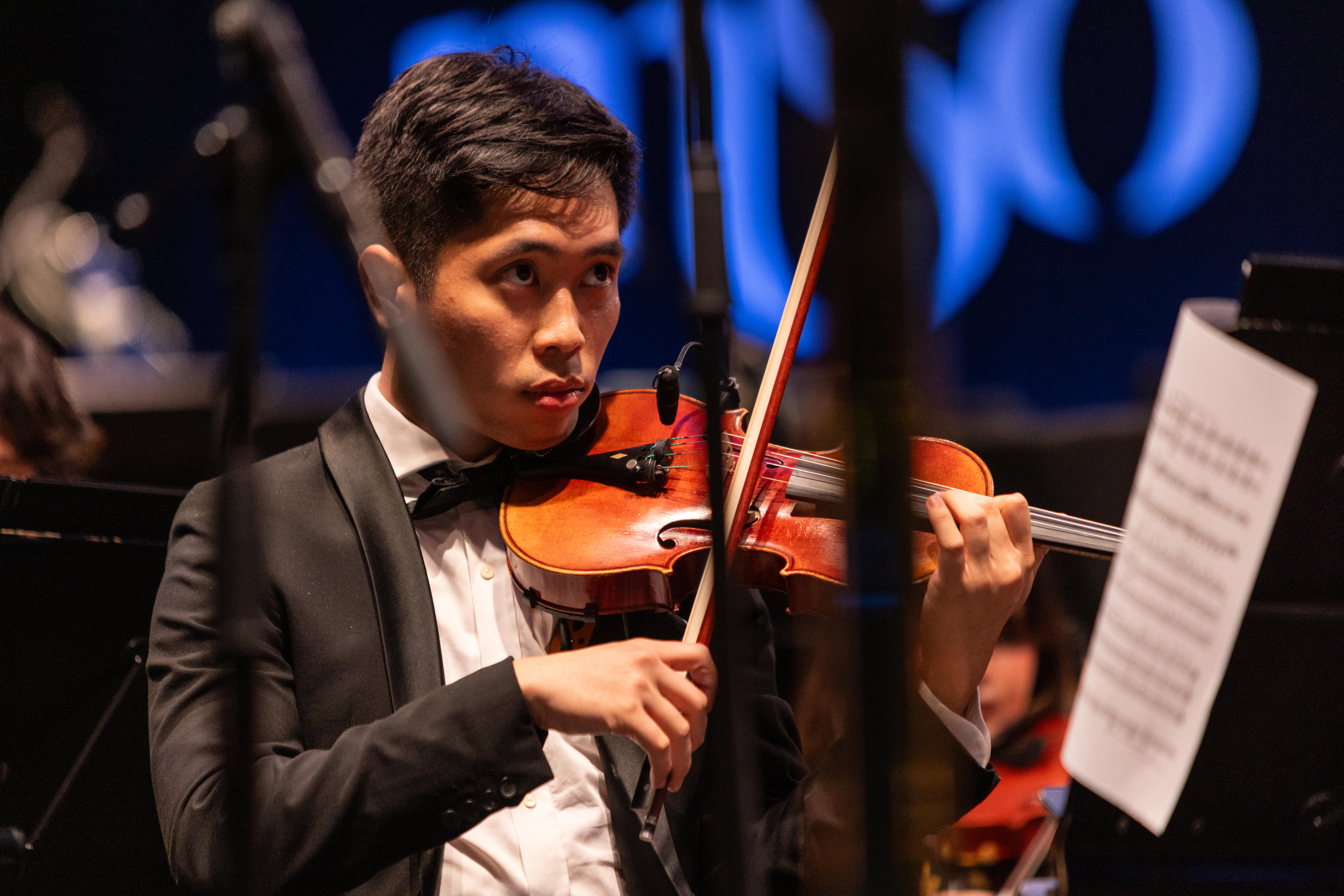 Morgan Ip playing violin in the Australian Youth Orchestra.