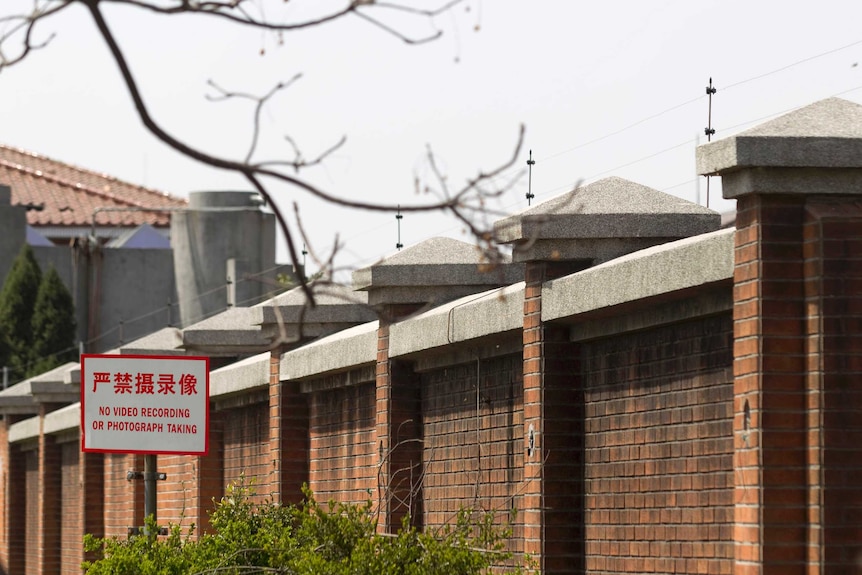A warning sign is seen outside the Shanghai No.1 Detention Center.