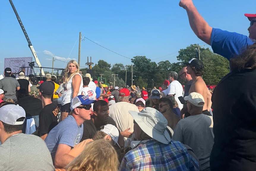 Crowds duck for cover after shooting at Trump rally. 