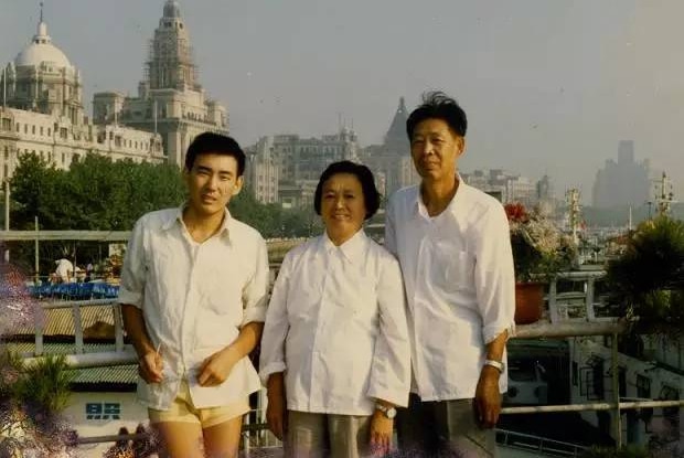 Yang Hengjun pictured with his parents during his university years.