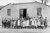 Historical photos of a Tasmanian class with teacher