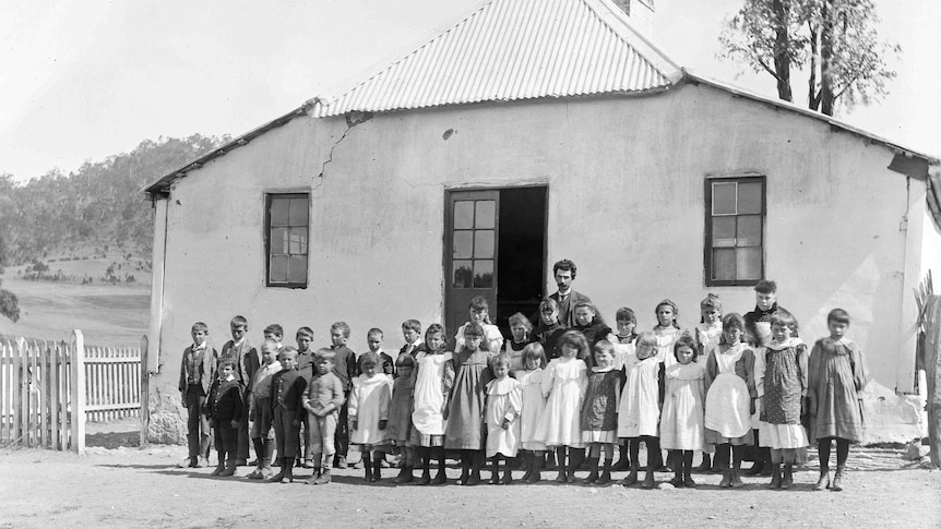 Historical photos of a Tasmanian class with teacher