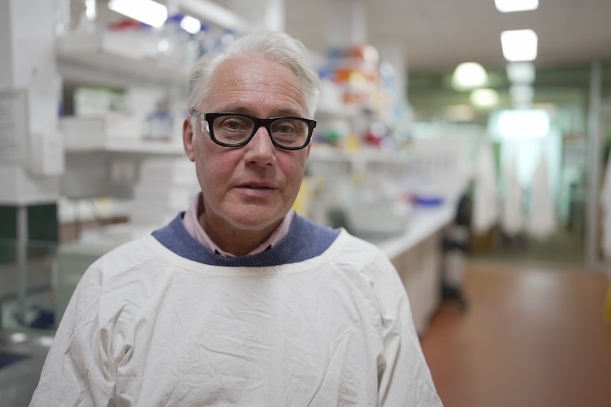Close-up of Michael Buckland wearing a lab coat