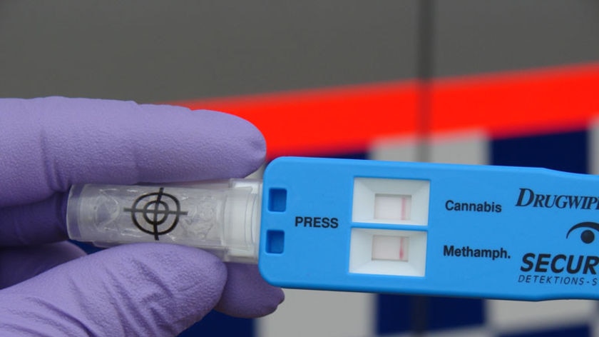 Hand held police drug testing device showing a negative result