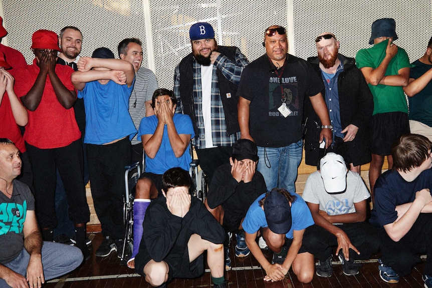 Adam Briggs with youth inside the Reiby Detention Centre