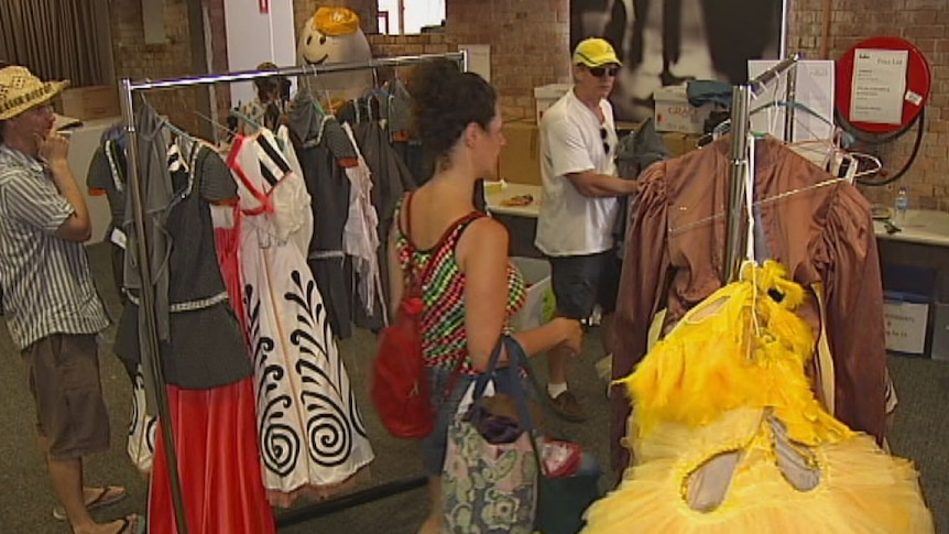 Shoppers look for bargains at Qld Ballet costume and scenery sale at West End