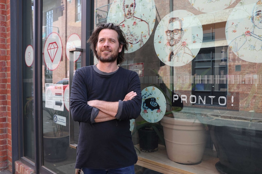 Professor Mark Stoove stands outside clinic in Melbourne