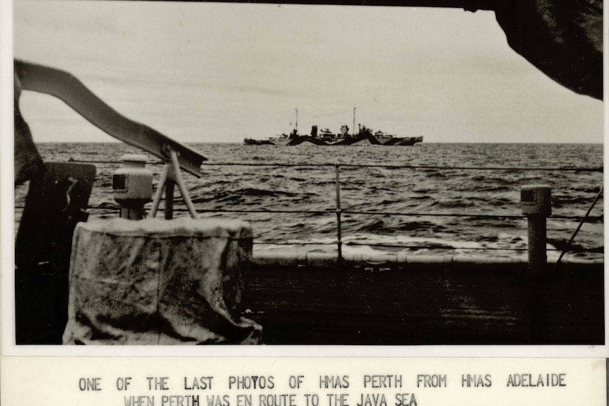 A black and white photo of the ship HMAS Perth during World War Two.