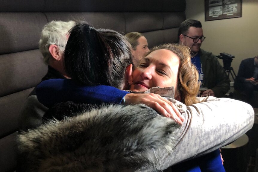 Georgina Downer hugged by a supporter on the night of the Mayo by-election.