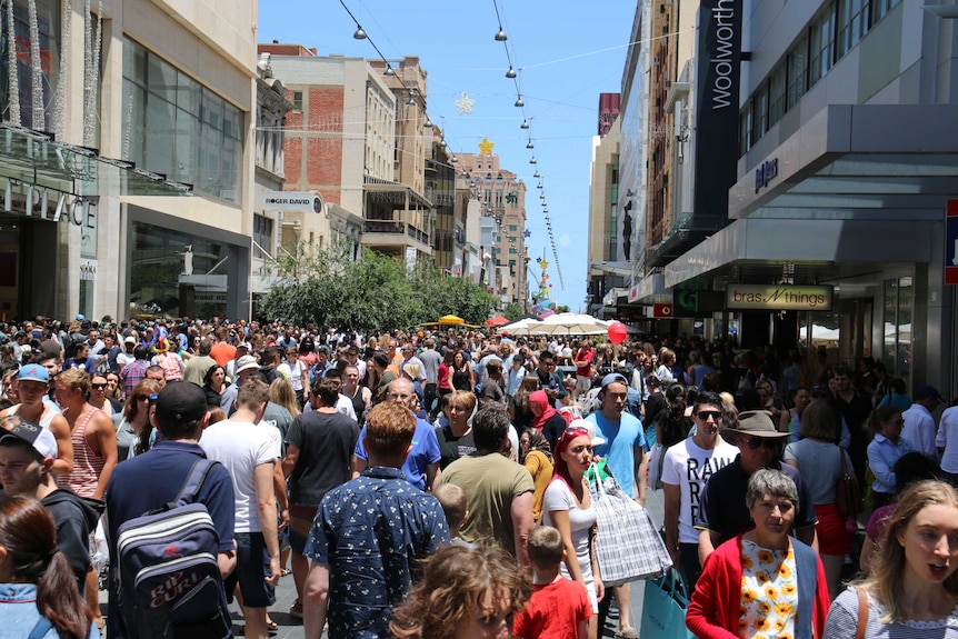 Shoppers crowd Adelaide's Rundle Mall.