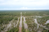 an aerial view of a flooded rural road