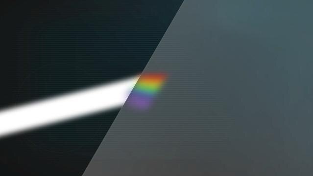 White light one one side of straight line, refracted light in form of rainbow on other side of straight line