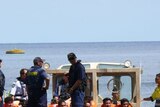 A group of 54 asylum seekers was taken to Christmas Island yesterday to await transfer overseas. (file photo)