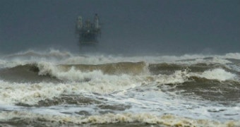 Larger than usual waves come ashore at Crystal Beach.