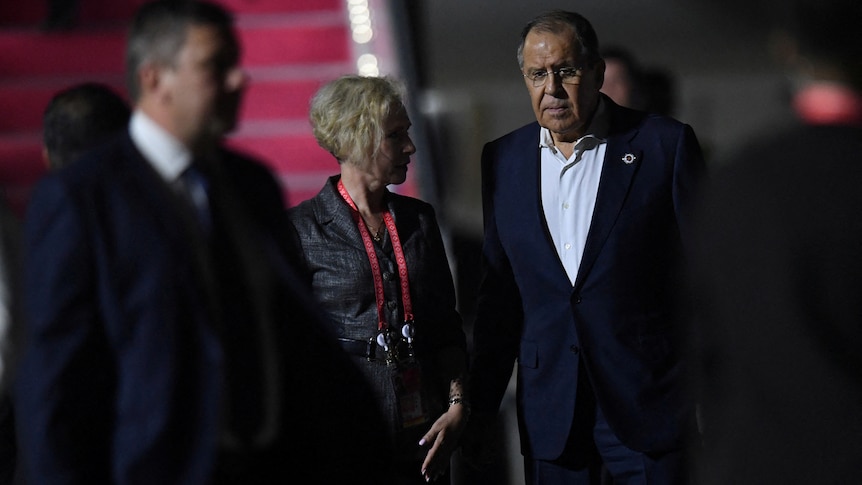 Russian Foreign Minister Sergey Lavrov arrives at Ngurah Rai International airport.