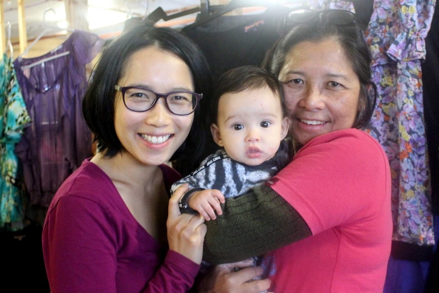 Garmisch Riley with her mother and daughter at a clothes swap.