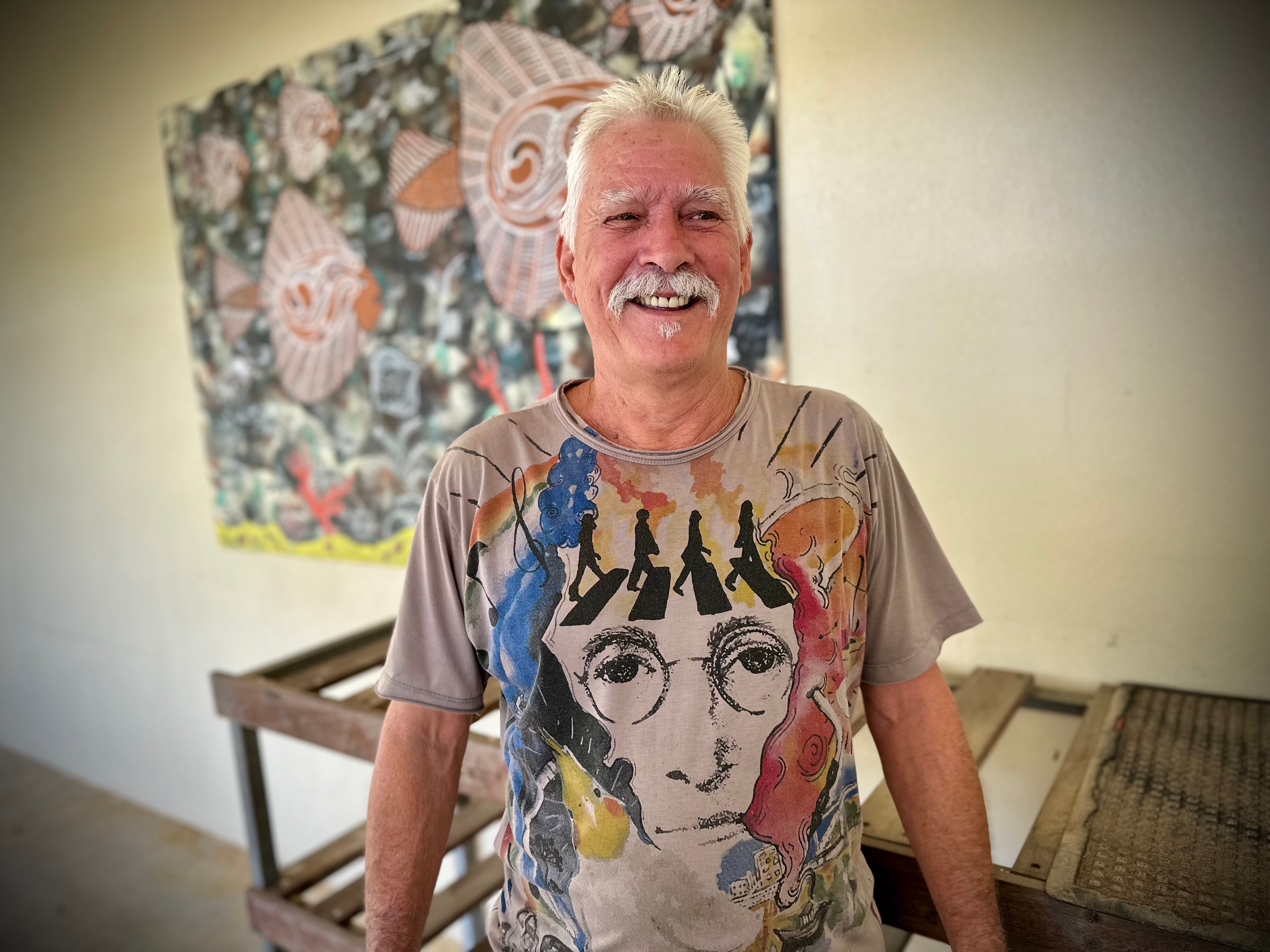 Older man looking at camera